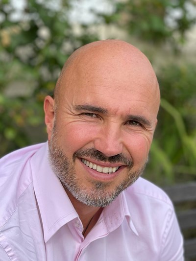 Rowland Johnson is credited with playing a major part in the non-for-profit organization's development in Singapore and America